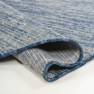 Callan Modern Rustic Abstract Indoor/Outdoor Shaped Area Rug