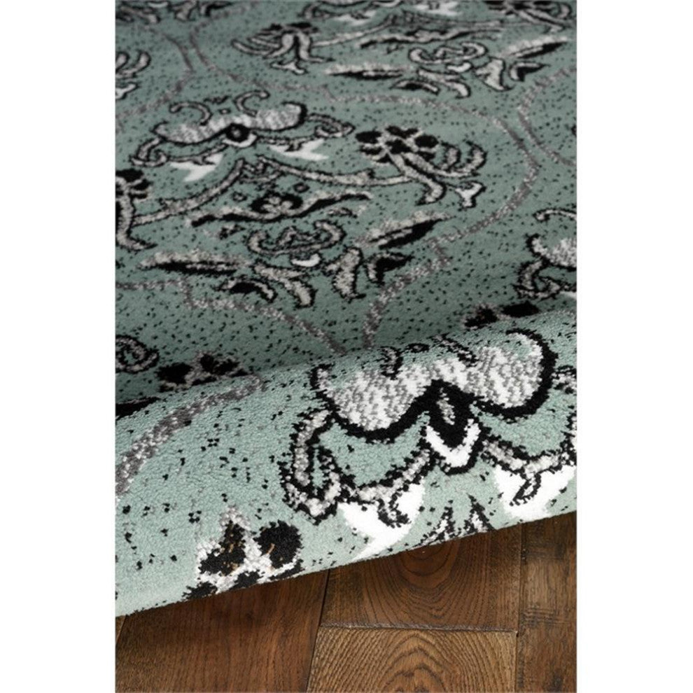 Linon Elegance England Power Loomed Polypropylene 5'x7'3" Rug in Turquoise Blue
