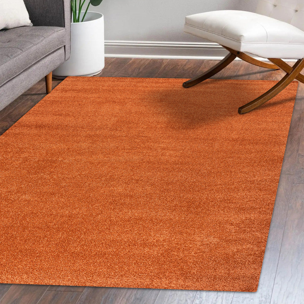Haze Solid Low-Pile Orange 9 ft. x 12 ft. Area Rug