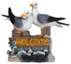 Seagulls on Pilings Welcome Sign