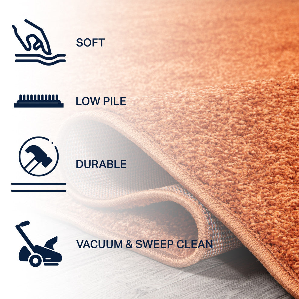 Haze Solid Low-Pile Orange 5 ft. x 8 ft. Oval Area Rug