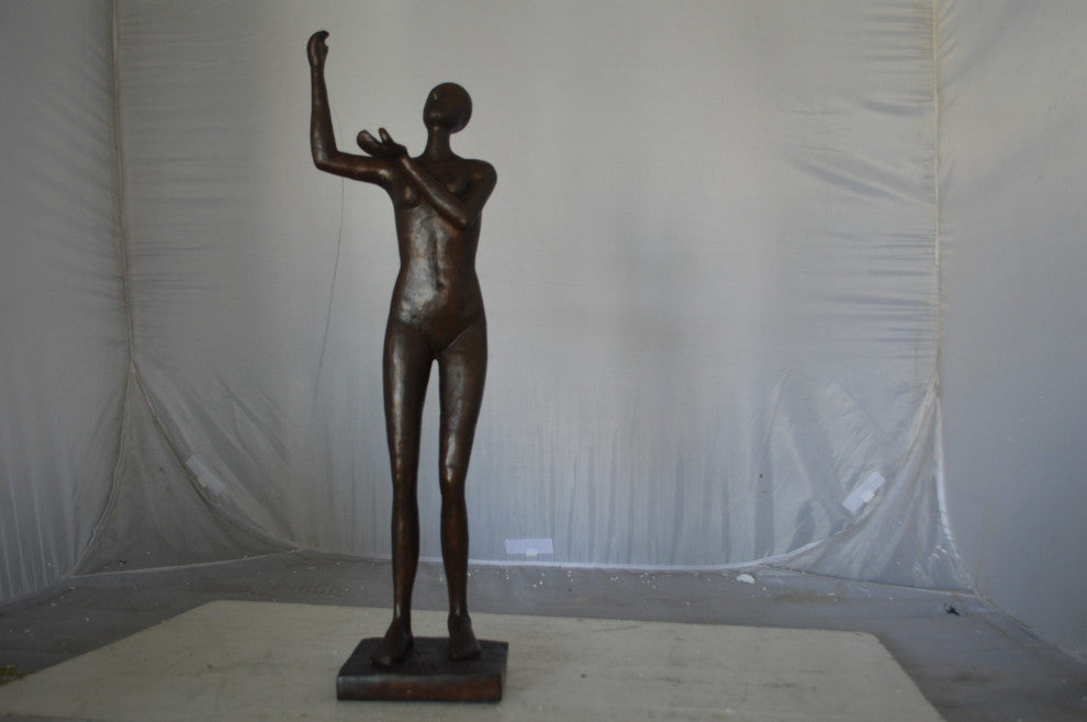 Abstract of nude lady lifting hand bronze statue - Size: 9"L x 6"W x 25"H.