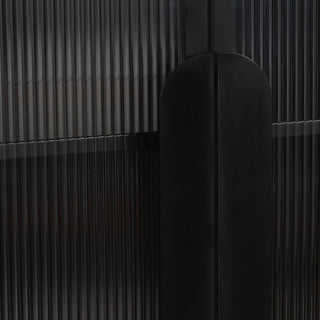 Close-up of ribbed panel/detail; dark background; no contextual setting