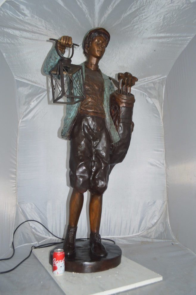 Caddy with light Bronze Statue -  Size: 30"L x 36"W x 64"H.