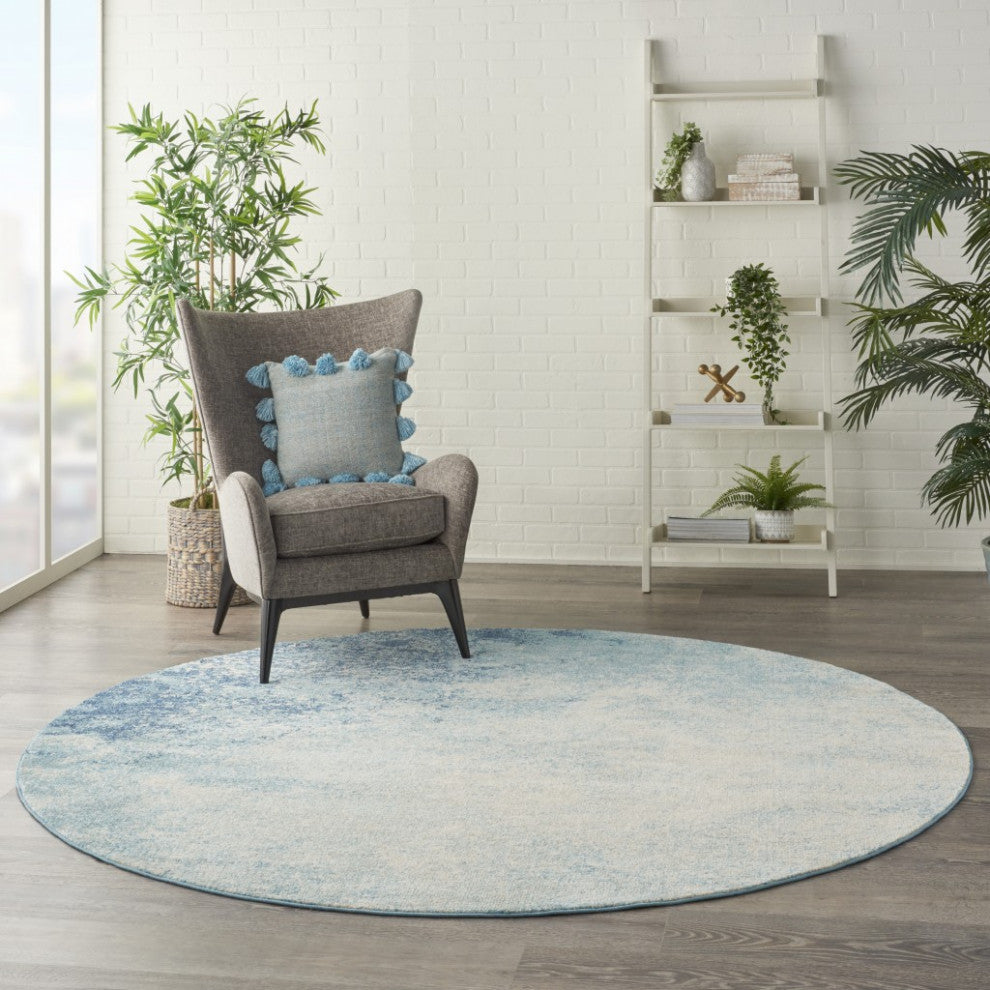 8' Ivory And Blue Round Abstract Power Loom Area Rug