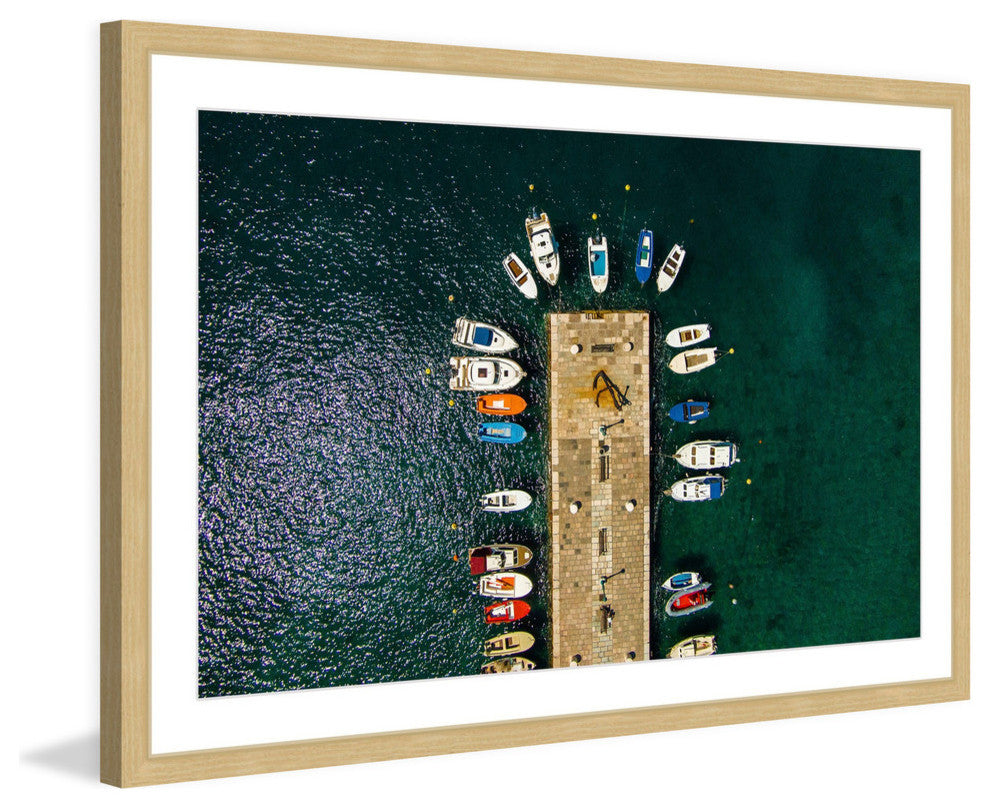 "Boats Docked" Framed Print by Karolis Janulis