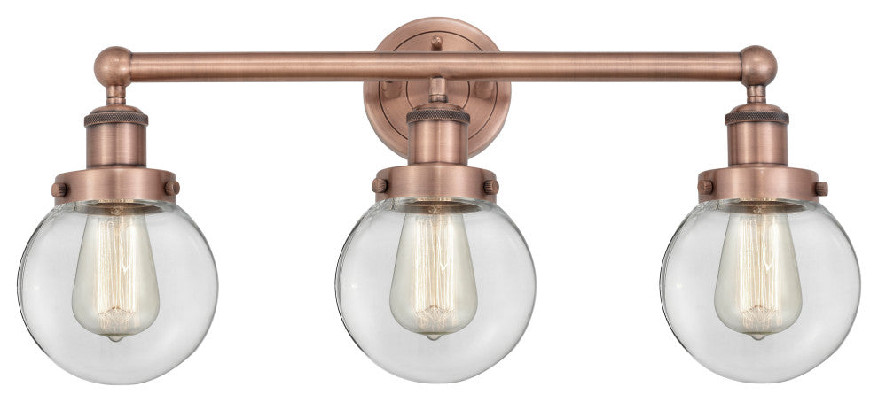 Small Edison Beacon 3-Light 25" Vanity Light, Antique Copper Finish, Clear Shade