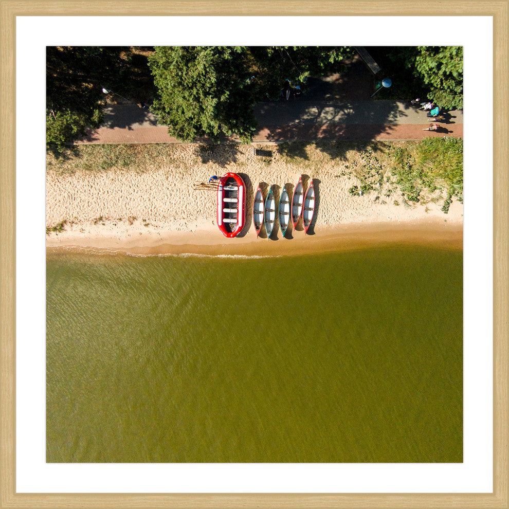 "Boats In A Row" Framed Print by Karolis Janulis