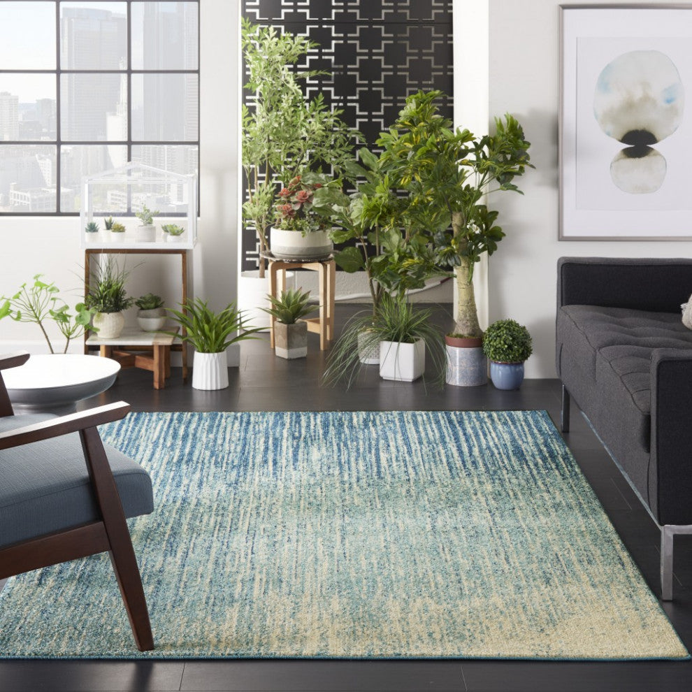 5' X 7' Ivory And Blue Abstract Stripes Power Loom Area Rug