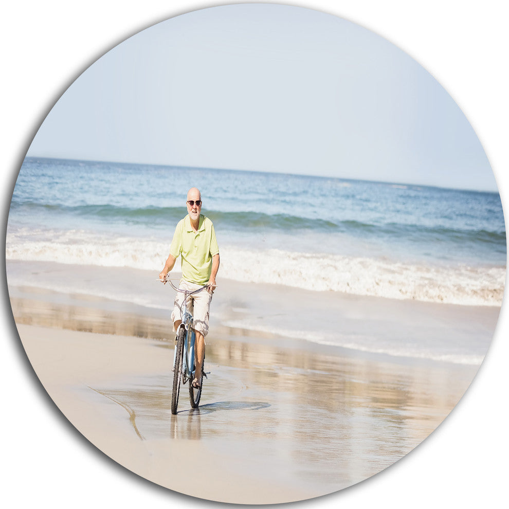 Smiling Senior Man Riding Bike, Landscape Disc Metal Wall Art, 38"