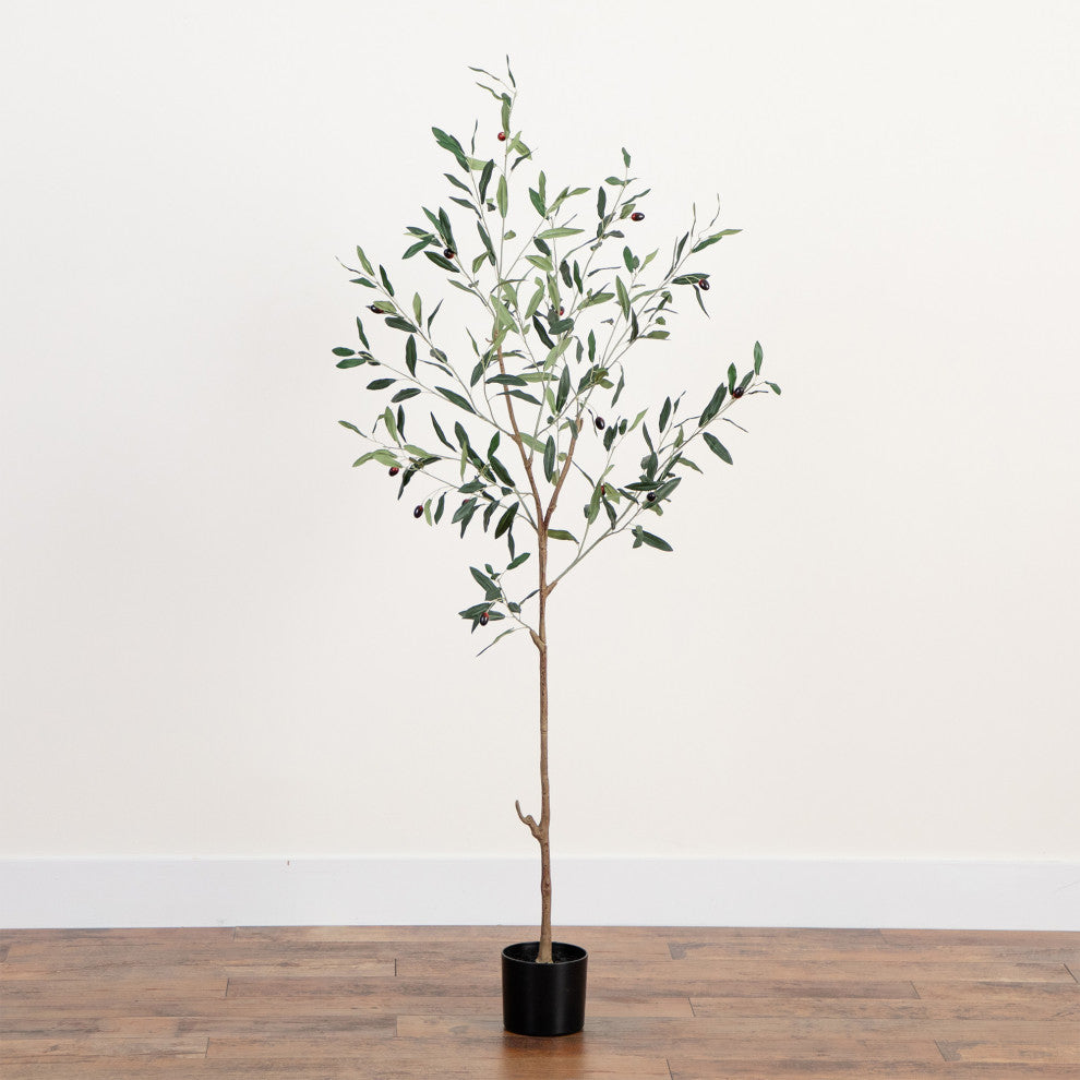 Lifestyle product image displaying the full tree with pot in room setting.