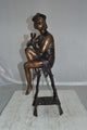 Lady W Champagne Glass Bronze Statue - Size: 8"L x 6"W x 22"H.