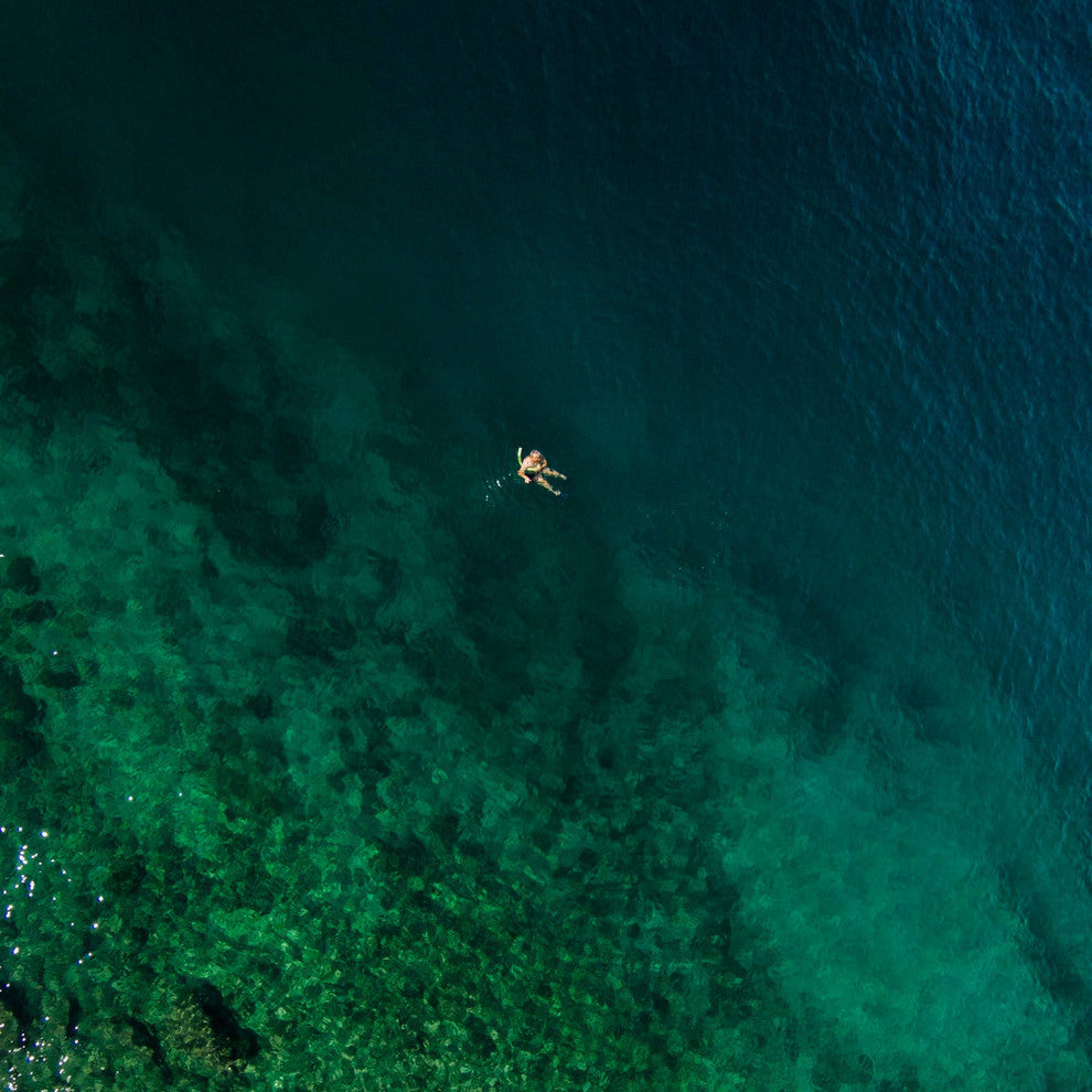 "Alone On A Float" Print on Canvas by Karolis Janulis