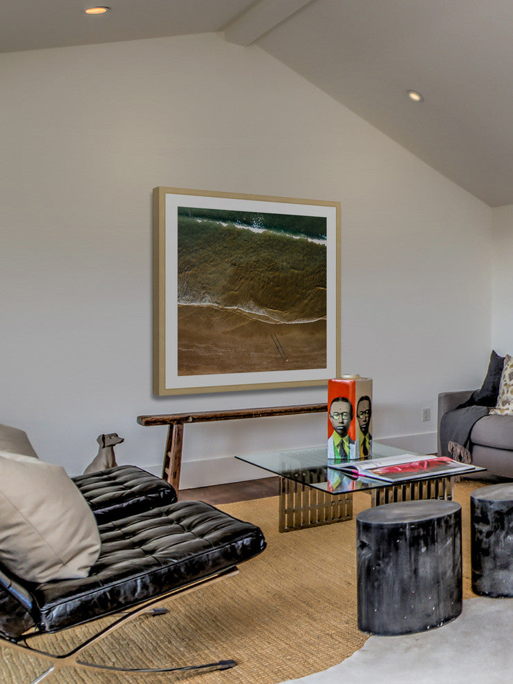 "Walking The Shore" Framed Print by Karolis Janulis