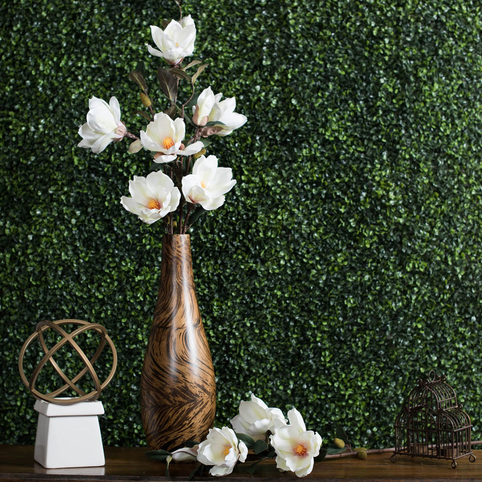 Lifestyle shot: real environment with Magnolia arrangement in vase; background is not white; product is fully visible and styled.