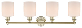 Edison Cobbleskill-4 Lt 32"Bath Vanity Lt-Antique Brass Finish-Matte White Shade