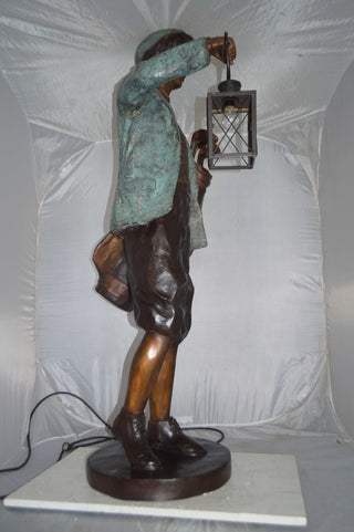 Caddy with light Bronze Statue -  Size: 30"L x 36"W x 64"H.
