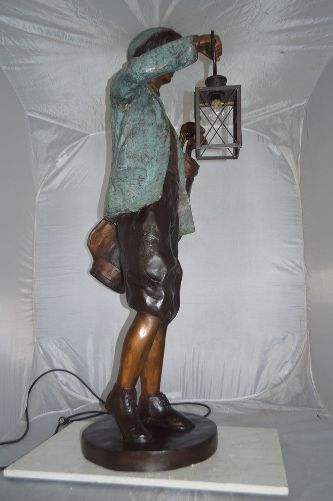 Caddy with light Bronze Statue -  Size: 30"L x 36"W x 64"H.