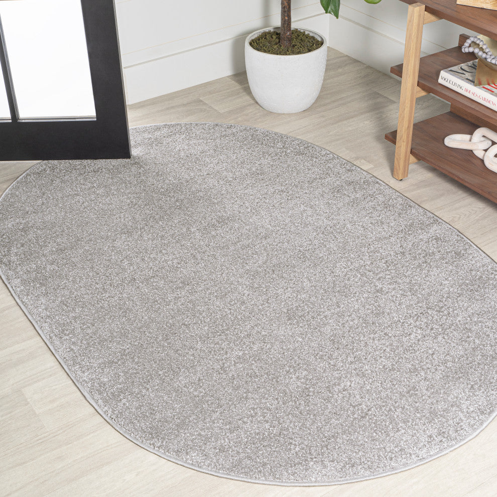 Haze Solid Low-Pile Light Gray 6 ft. x 9 ft. Oval Area Rug