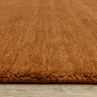 Apollo Heathered Solid Rust Hand-Made Wool Area Rug 6' x 9'