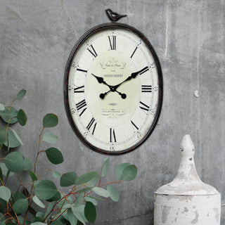 Oval Metal Wall Clock With Bird