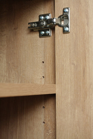 Close-up of hinge/side detail on white background