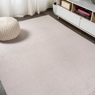 Haze Solid Low-Pile Beige 6 ft. x 9 ft. Area Rug