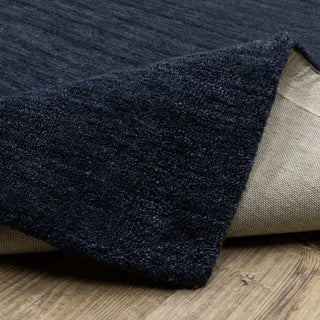 Apollo Heathered Solid Navy Blue Hand-Made Wool Area Rug 5' x 8'