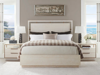Lifestyle image; bedroom scene featuring the nightstand with bed; product fully visible with surrounding context.
