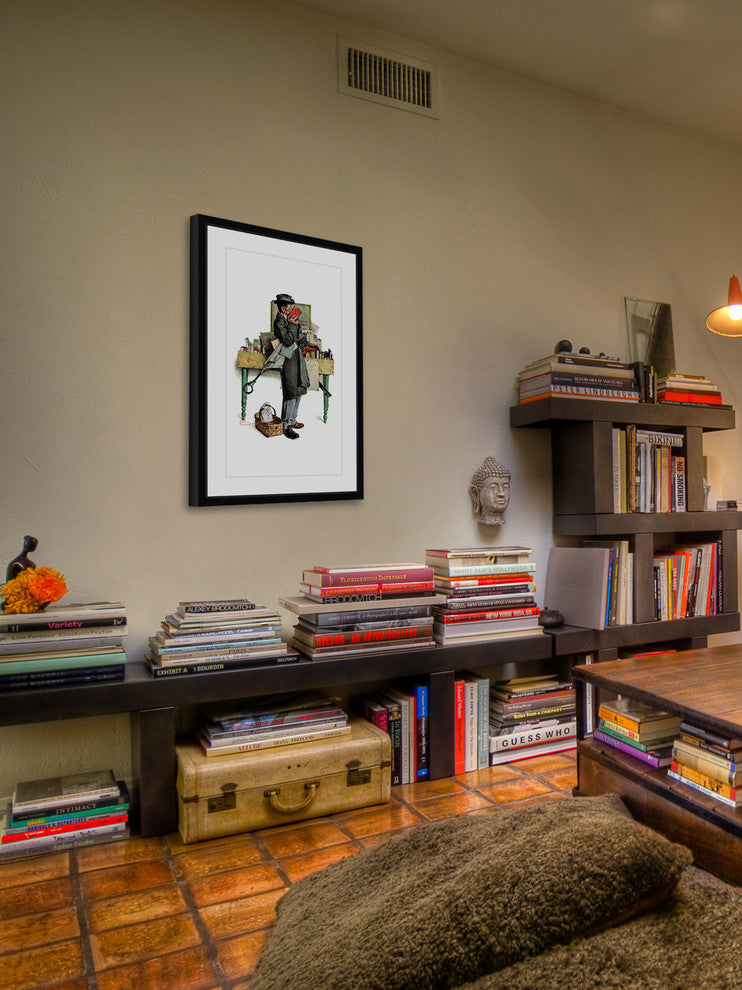"Bookworm" Framed Art Print by Norman Rockwell