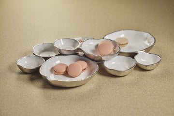Cluster of Nine Round Serving Bowls With White Enamel Interior, Silver