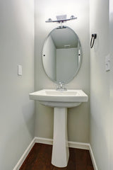 Frameless Oval Tilt Mirror with Beveled Edge, Satin Nickel