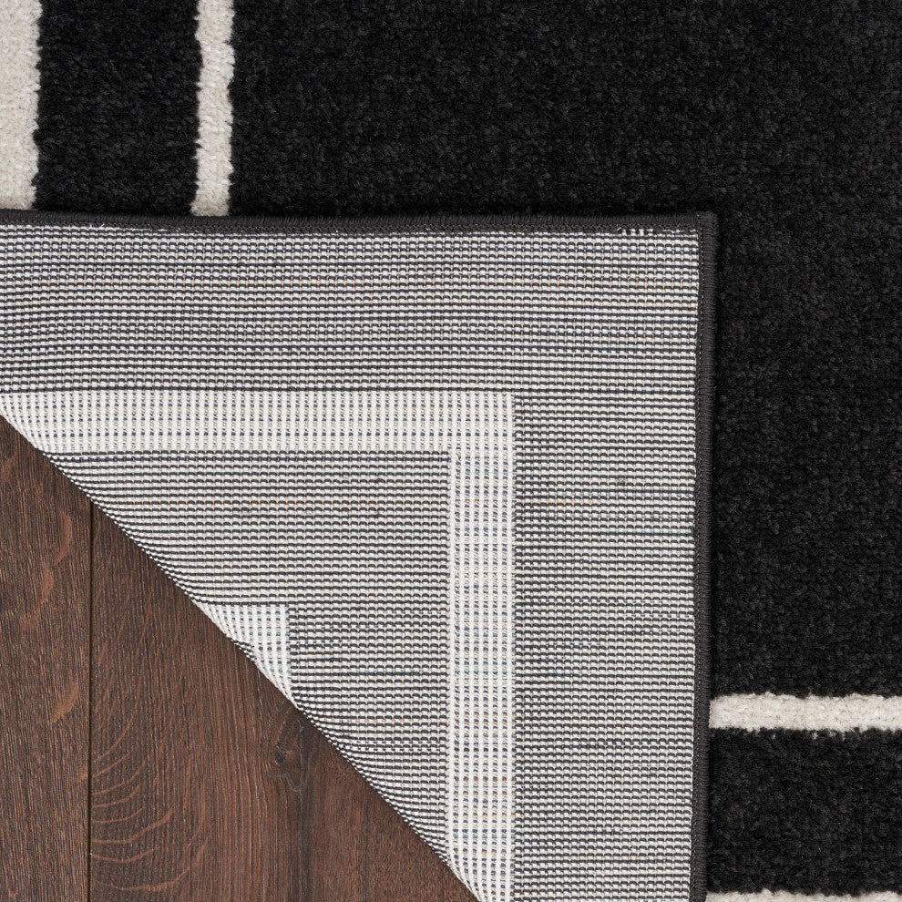 Nourison Essentials 2' x 4' Black Ivory Contemporary Area Rug