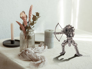 Metal Predator With Bow and Arrow