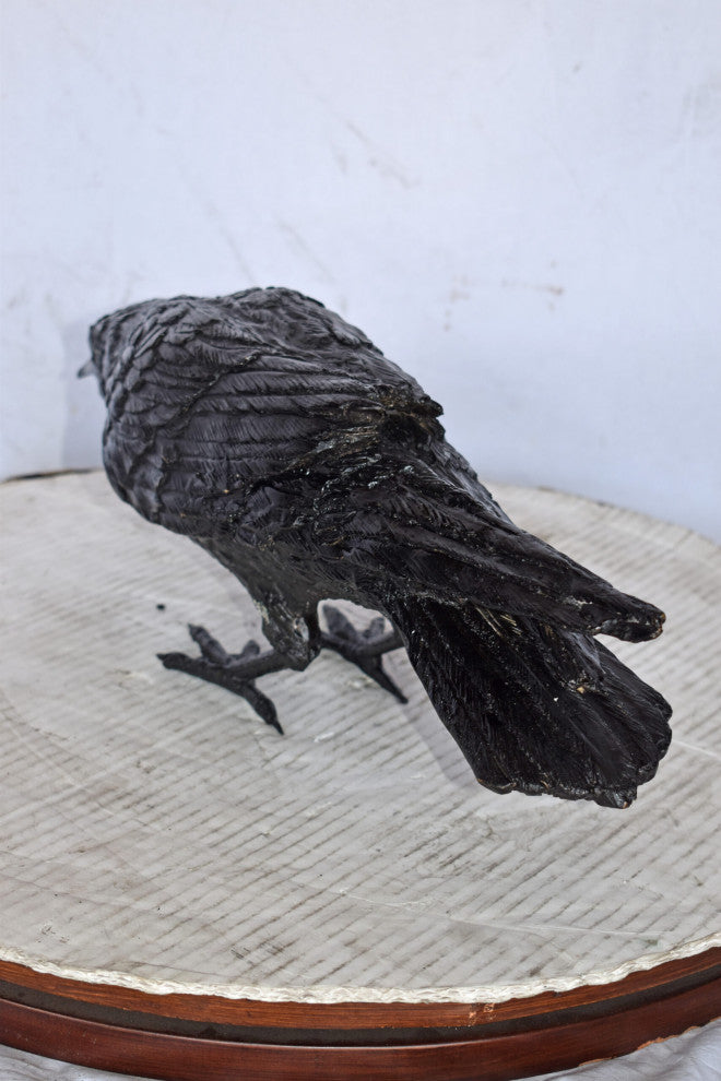 Raven Looking for Food Bronze State - Size: 24"L x 6"W x 12"H.