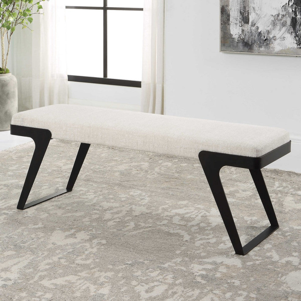 Hover Bench is streamlined With an aged black curved iron base