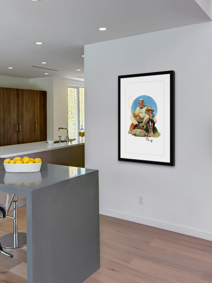 "Catching the Big One" Framed Art Print by Norman Rockwell