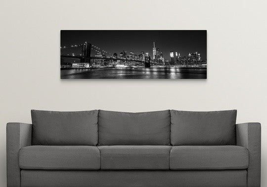 "New York City Skyline with Brooklyn Bridge in Foreground, at Night" Wrapped