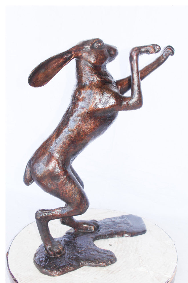 Leaping jackrabbit bronze statue -  Size: 21"L x 13"W x 24"H.