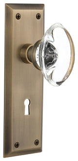 Double New York Plate With Oval Clear Crystal Knob, Antique Brass