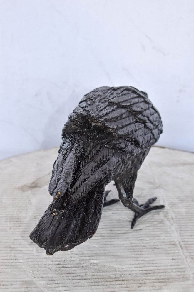 Raven Looking for Food Bronze State - Size: 24"L x 6"W x 12"H.