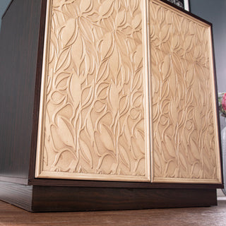 White-background close-up of carved panel/texture on cabinet face.