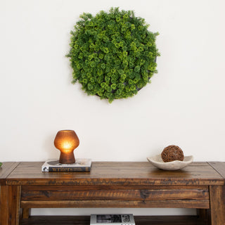 Lifestyle shot: moss panel displayed in a real room with decor; full panel visible.
