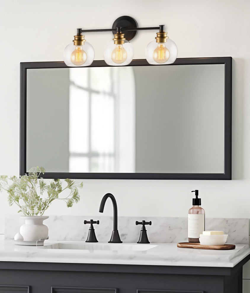 Kira Home Odette 22" Bathroom Light, Glass Globe Shades, Warm Brass Accents, Oil