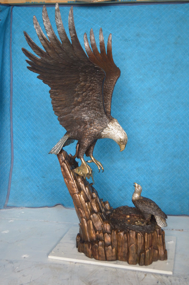 Eagle with nest Bronze Statue -  Size: 36"L x 40"W x 63"H.