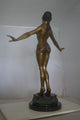 Belly Dancer Performing Bronze Statue -  Size: 32"L x 8"W x 41"H.