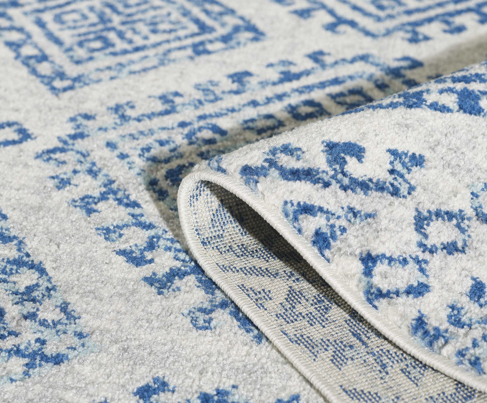 7'X12' Ivory Blue Machine Woven Distressed Geometric Indoor Area Rug