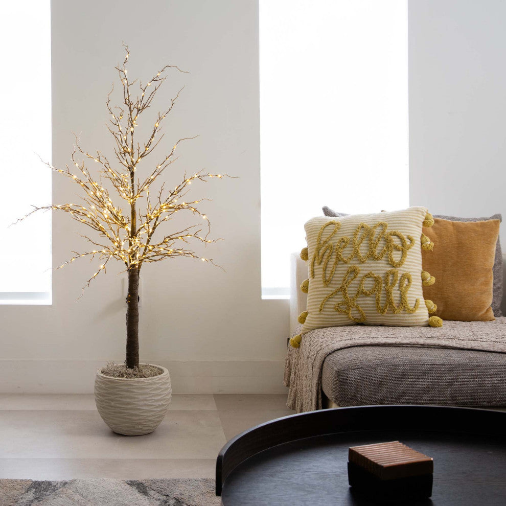 Lifestyle room scene showing the entire tree with pot