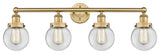 Small Beacon 4-Light 34" Bath Vanity Light, Brushed Brass Finish, Clear Shade