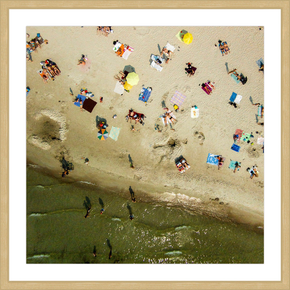 "Beach Goers" Framed Print by Karolis Janulis